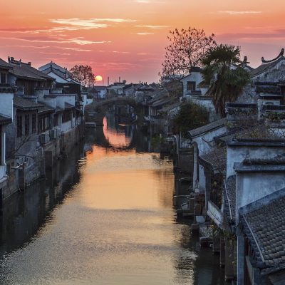 buildings river dusk shaxi yunnan china