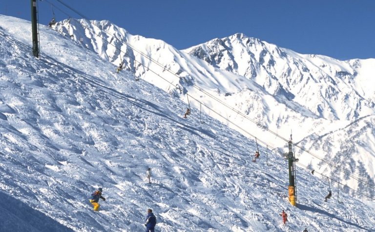 skiers snow mountain Hakuba Japan